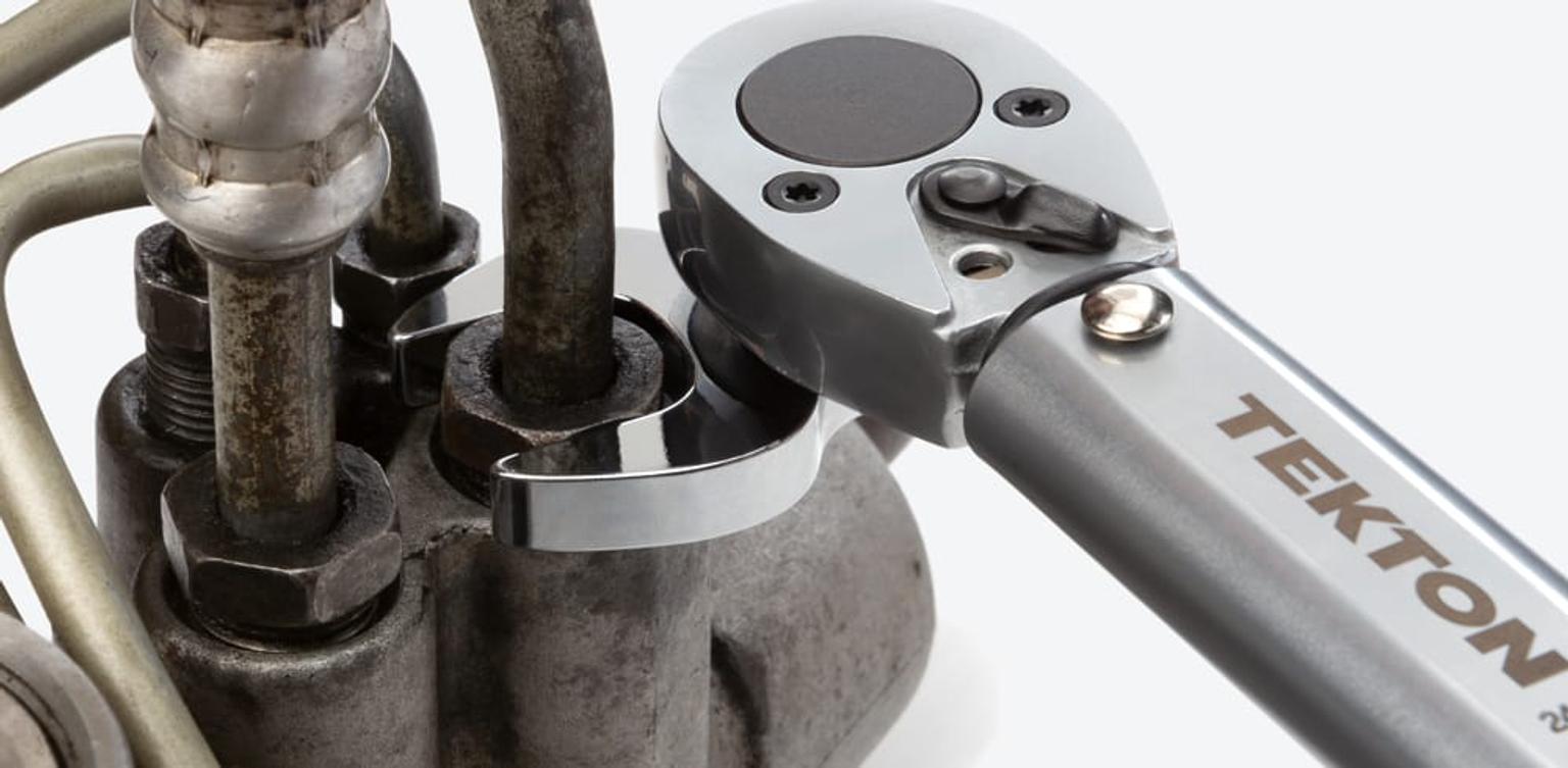 Tekton crowfoot wrench on a torque wrench tightening a fastener
